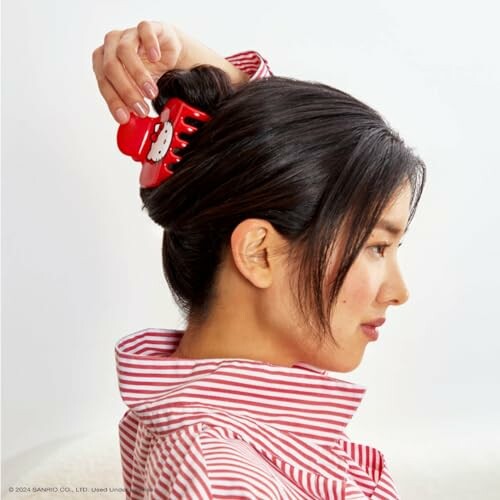 Woman with hair clip in side profile view