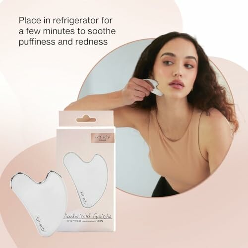 Woman using a gua sha tool on her face next to product packaging.